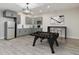 Entertaining living room features a foosball table and kitchenette at 24701 Us Hwy 40, Golden, CO 80401