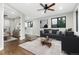 Bright living room with an open concept with hardwood floors and large windows at 24701 Us Hwy 40, Golden, CO 80401