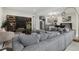 Comfortable living room with a large couch, fireplace, and built-in shelving at 24701 Us Hwy 40, Golden, CO 80401