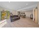 Open concept basement with recessed lights, kitchen, dining area, and living room at 24701 Us Hwy 40, Golden, CO 80401