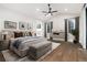 Bright primary bedroom featuring vaulted ceiling and hardwood flooring at 24701 Us Hwy 40, Golden, CO 80401