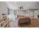 Spacious playroom has hardwood floors, lots of natural light, and built-in storage at 24701 Us Hwy 40, Golden, CO 80401