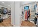 Spacious walk-in closet with custom shelves and drawers offers ample storage and organization at 24701 Us Hwy 40, Golden, CO 80401