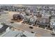 Expansive aerial view of a residential neighborhood with various home styles and well-maintained streets at 6315 N Emporia St, Denver, CO 80238