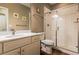 Bathroom with new vanity, modern sink, and a tiled shower at 22662 E Narrowleaf Cir, Aurora, CO 80016