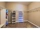 Walk-in closet with built-in shelving for optimal storage and organization at 22662 E Narrowleaf Cir, Aurora, CO 80016