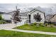 Charming two-story home with landscaped yard and attached two car garage at 22662 E Narrowleaf Cir, Aurora, CO 80016