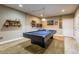 Basement game room with pool table, recessed lighting, and classic decor at 22662 E Narrowleaf Cir, Aurora, CO 80016