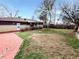 Spacious backyard offering potential for landscaping and outdoor activities and entertainment at 13477 E Center Ave, Aurora, CO 80012