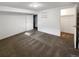 Basement bedroom area offering a closet and adjacent storage, ready for customization at 13477 E Center Ave, Aurora, CO 80012