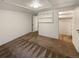 Another basement bedroom providing closet space and access to additional storage areas at 13477 E Center Ave, Aurora, CO 80012