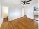 Spacious bedroom with hardwood floors and two entryways at 13477 E Center Ave, Aurora, CO 80012