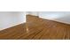 Spacious room with hardwood flooring and neutral walls at 13477 E Center Ave, Aurora, CO 80012