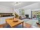 Open dining area with view to the kitchen and living room at 701 Harlan St # E29, Lakewood, CO 80214