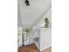 Bright entryway showcasing hardwood stairs and a large window view at 701 Harlan St # E29, Lakewood, CO 80214