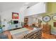 Open-concept living room features vaulted ceilings, and a view of the kitchen at 701 Harlan St # E29, Lakewood, CO 80214