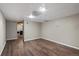 Spacious finished basement with hardwood floors and recessed lighting at 7476 E Arkansas Ave # 1-03, Denver, CO 80231