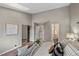 Vaulted ceiling bedroom with hardwood floors and closet with sliding doors at 7476 E Arkansas Ave # 1-03, Denver, CO 80231