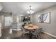 Inviting dining room next to kitchen and living room at 7476 E Arkansas Ave # 1-03, Denver, CO 80231