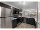 Well-equipped kitchen with stainless appliances and modern finishes at 7476 E Arkansas Ave # 1-03, Denver, CO 80231