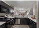 Modern kitchen with stainless steel appliances and white countertops at 7476 E Arkansas Ave # 1-03, Denver, CO 80231