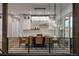 Elegant dining room featuring modern lighting fixtures and an open layout from an elevated perch at 11229 Running Kit Pl, Franktown, CO 80116