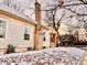 Side view of the house with snow on the ground at 3890 N Wolff St, Denver, CO 80212