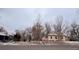 Street view of house showing the side and front yards at 3890 N Wolff St, Denver, CO 80212