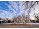 Charming single-story home with a chimney, small front yard, and easy street access at 3890 N Wolff St, Denver, CO 80212