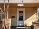 Close up of the front door with a wreath and the house number at 3890 N Wolff St, Denver, CO 80212