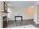 Living room with fireplace and hardwood floors at 1312 S Cathay Ct # 202, Aurora, CO 80017