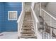 Exterior stairs leading to a townhome entrance at 1312 S Cathay Ct # 202, Aurora, CO 80017