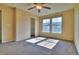 Bright bedroom with natural light, carpet, and a ceiling fan at 17205 Waterhouse Cir # C, Parker, CO 80134