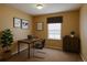Bright office space with modern desk, chair, and natural light, creating an ideal work-from-home environment at 17205 Waterhouse Cir # C, Parker, CO 80134