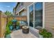 Cozy outdoor patio with grill and decorative seating, ideal for relaxation and entertaining at 17205 Waterhouse Cir # C, Parker, CO 80134