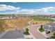 Community aerial view with parks, pathways and modern homes in a vibrant neighborhood at 7117 Frying Pan Dr, Frederick, CO 80530