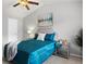 Serene bedroom boasts elegant furnishings, soft lighting, and a tranquil ambiance at 13906 Jackson St, Thornton, CO 80602