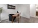 Minimalist home office with sleek desk, modern decor, and a peaceful atmosphere at 1326 Sable Blvd, Aurora, CO 80011