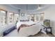 Bright and spacious main bedroom with a curved ceiling and large windows at 1459 N Pennsylvania St # B, Denver, CO 80203