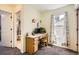 Bedroom features a dedicated desk area with natural light and neutral finishes at 9882 Harris St, Thornton, CO 80229