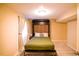 Basement space with built-in Murphy bed, offering convenient guest accommodations at 12498 W Prentice Dr, Littleton, CO 80127