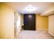 Basement space with Murphy bed and large window providing natural light at 12498 W Prentice Dr, Littleton, CO 80127