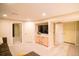 Finished basement offers versatile space with a TV area and easy access at 12498 W Prentice Dr, Littleton, CO 80127