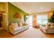Cozy living room with large window, neutral colored furniture, and bright, airy atmosphere at 12498 W Prentice Dr, Littleton, CO 80127
