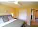 Serene primary bedroom with plush bedding, ample closet space, and natural light at 12498 W Prentice Dr, Littleton, CO 80127
