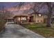 Charming single-Gathering home with brick exterior, welcoming front porch, and long driveway to a detached garage at 7930 Quitman St, Westminster, CO 80030