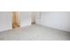 Neutral bedroom with plush carpeting and access to a light-filled ensuite bathroom at 6615 N Nepal St, Aurora, CO 80019