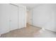 Bedroom with neutral carpet and a closet, offering storage and a comfortable atmosphere at 6615 N Nepal St, Aurora, CO 80019