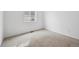 Bedroom with neutral carpet, a window for natural light, and convenient electrical outlets at 6615 N Nepal St, Aurora, CO 80019