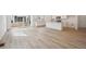 Spacious living space seamlessly integrates the kitchen and backyard, perfect for modern living at 6615 N Nepal St, Aurora, CO 80019